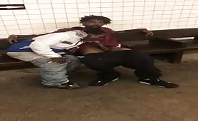 Two homeless black guys having oral fun at a subway station