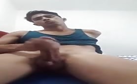Cute latin twink stroking his tasty cock