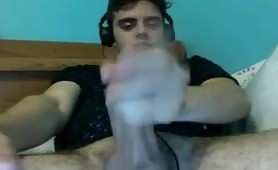 Thick cock boy with headphones jerking off