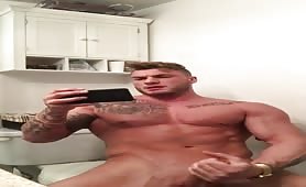 Big muscle tattooed stud wanking his tasty cock