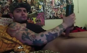 Cute tattooed skater using his new toy to masturbate