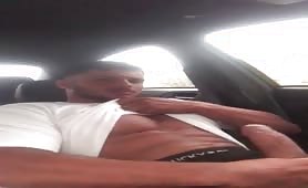 Horny dude masturbating in his car while waiting for his wife