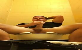 Horny young dude masturbates in public bathroom 