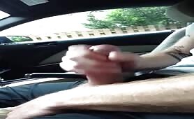 Wanking my cock in the car while waiting for my wife