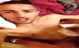 Handsome latino getting a load on his face