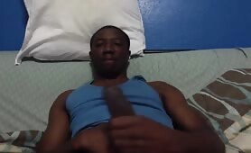 Haitian guy rubbing his cock gently in front of the webcam