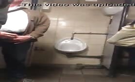 Masturbating a stranger in a public bathroom