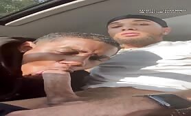 Black thug sucking his friend's huge dick in the car