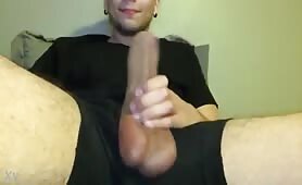 Pierce young latino showing his huge piece of meat