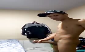 Young brazilian showing his massive curved cock