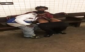 Two homeless black guys having oral fun at a subway station