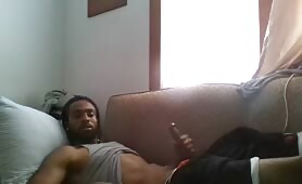 Hot jamaican dude wanking his cock on his sofa