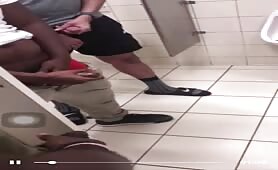 Group of horny guys stroking their cock in public toilet